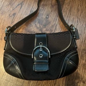 Coach under arm purse, black fabric pattern